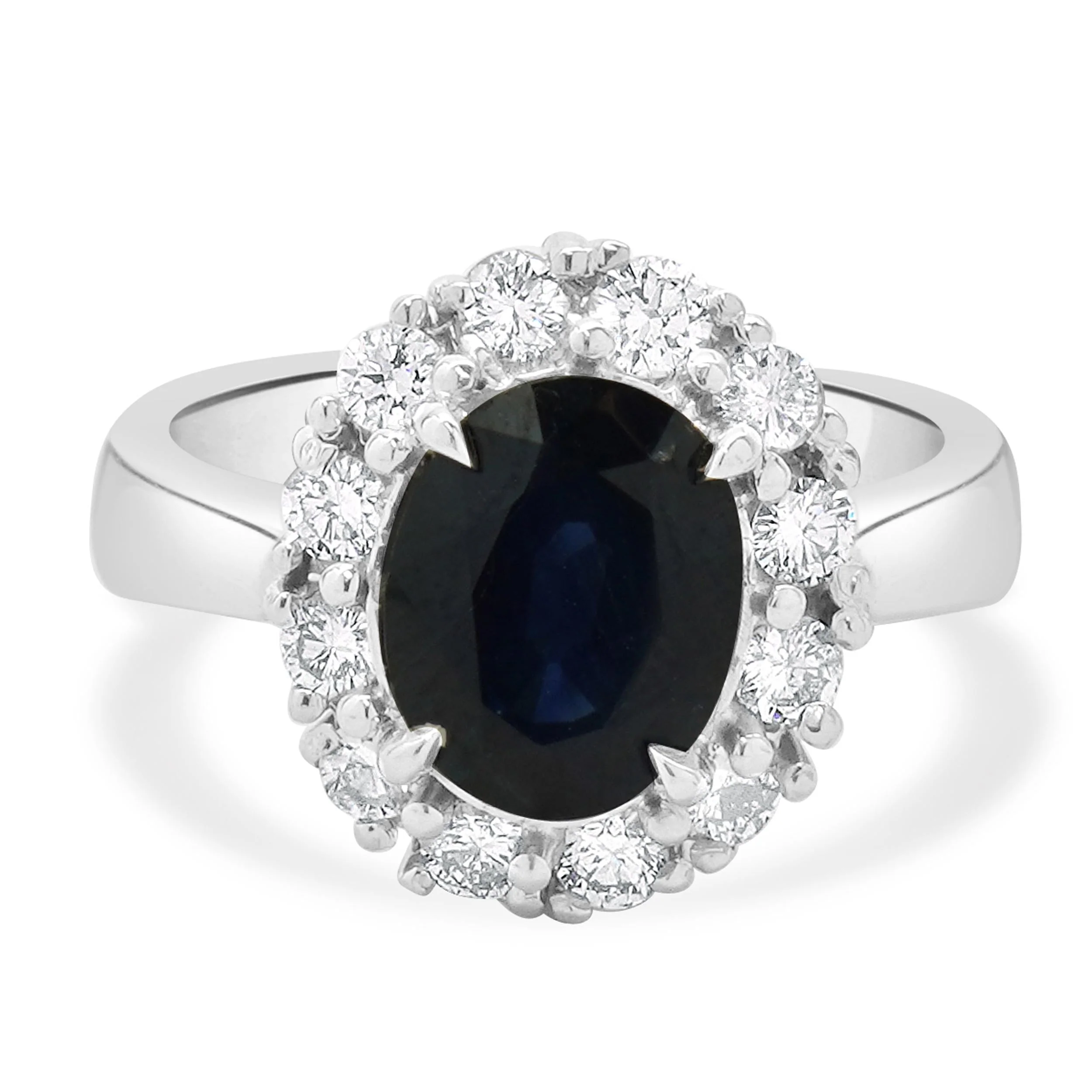 14 Karat White Gold Sapphire and Diamond Halo Ring